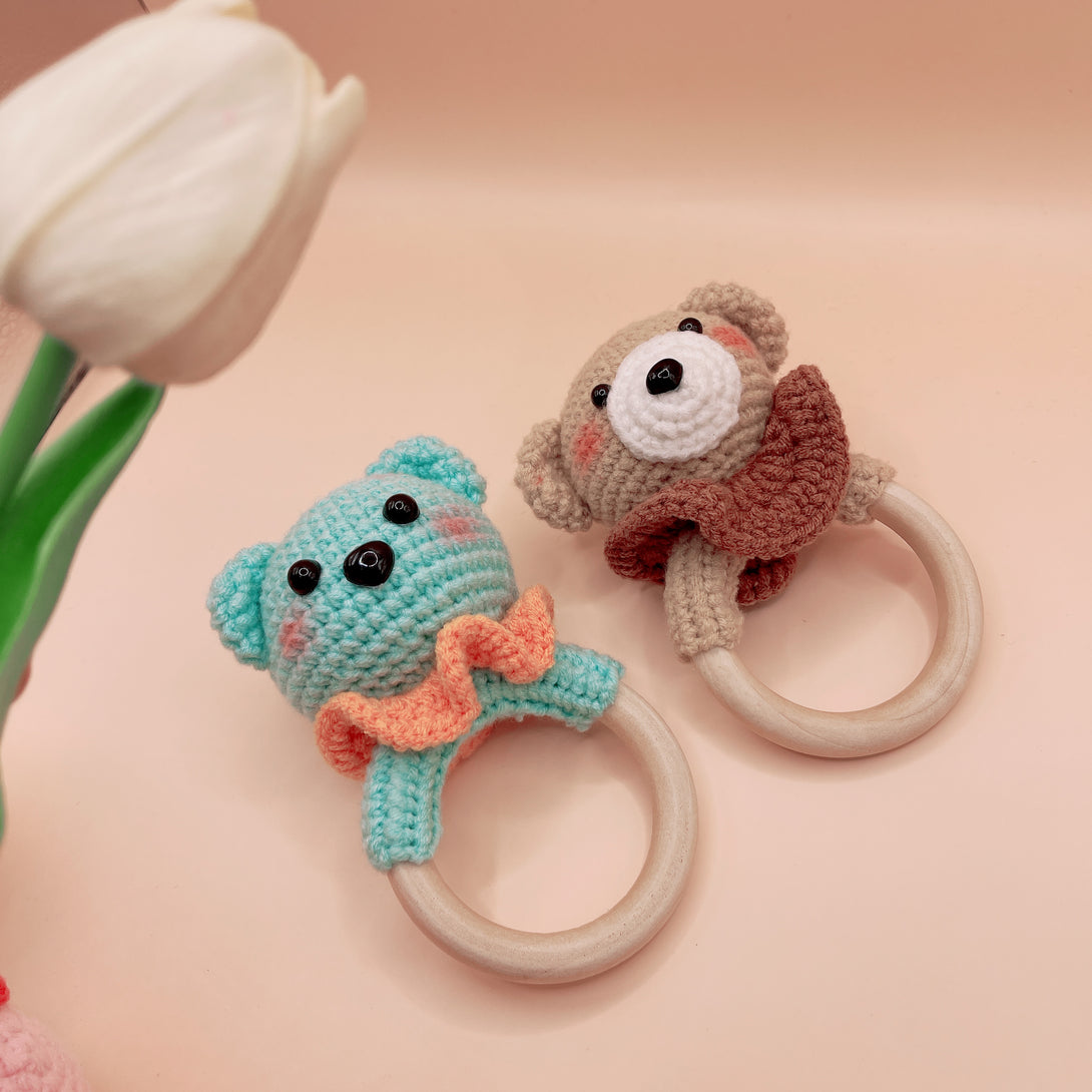 Stitchery Zone animal crochet rattle set with bear and koala designs on wooden rings