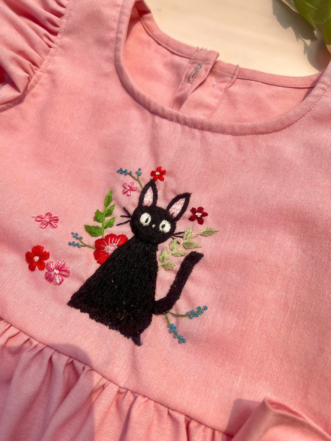 Black Cat Hand Embroidered Pink Dress featuring detailed floral embroidery on soft fabric by Stitchery Zone