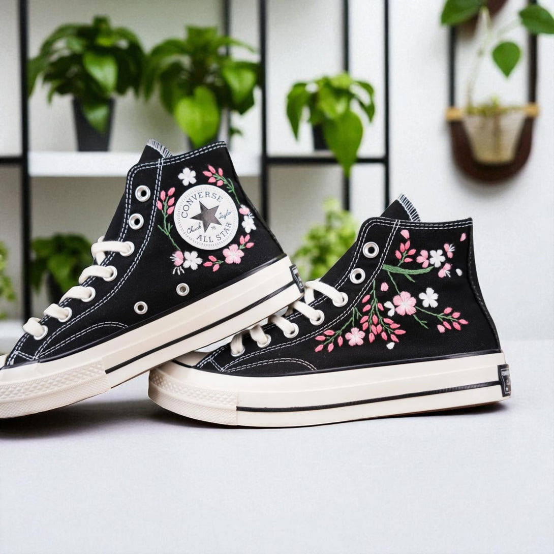 Blossom Handmade Personalized Sneakers by Stitchery Zone featuring white embroidered high-top shoes with purple floral design