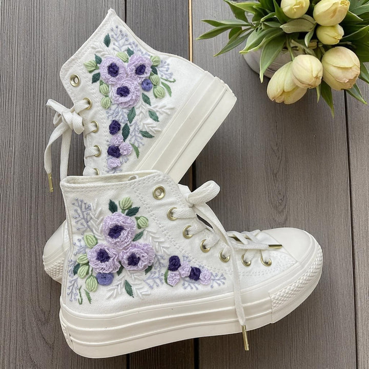 Bridal Flowers Embroidered Sneakers by Stitchery Zone with purple floral designs on white high-top canvas shoes