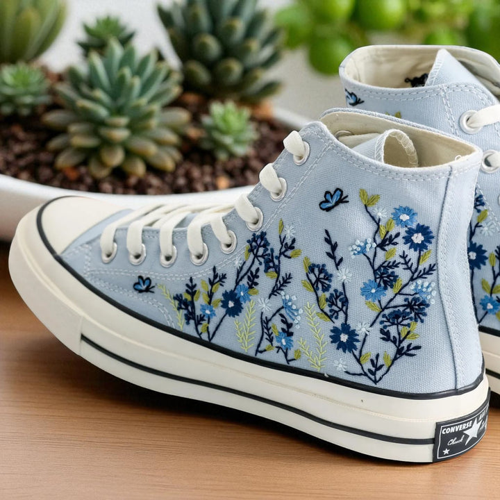 Stitchery Zone Blue Flower Embroidered Sneaker high top light blue canvas with detailed blue floral embroidery and white rubber sole