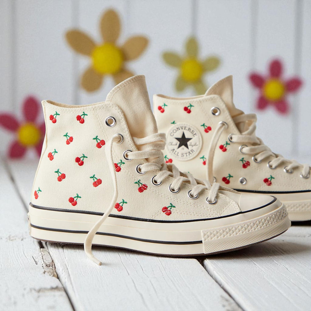 Converse embroidered high top canvas cherry sneakers in cream with red cherry pattern and classic rubber sole