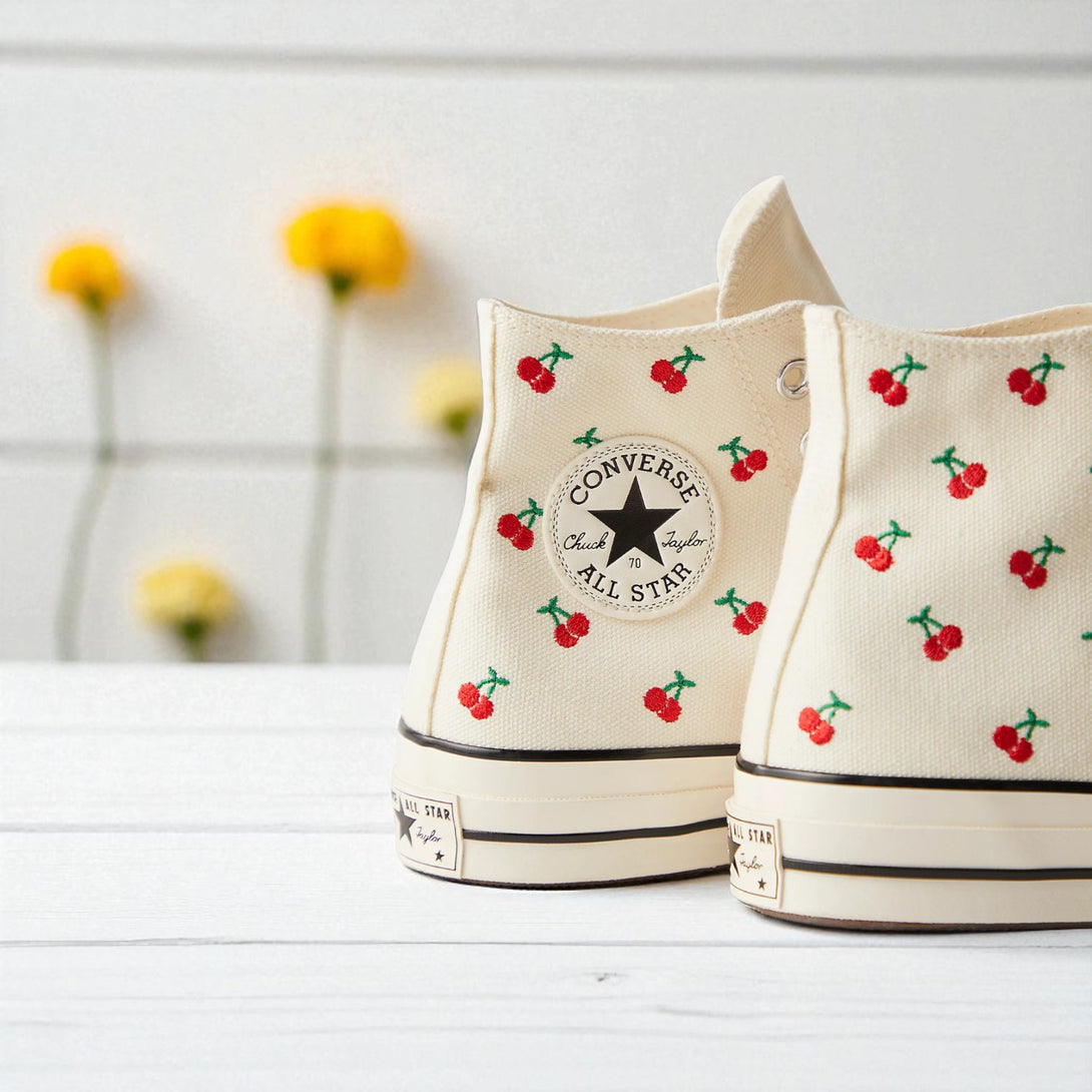 Converse embroidered cream high top cherry sneakers with red cherry pattern on canvas for casual wear