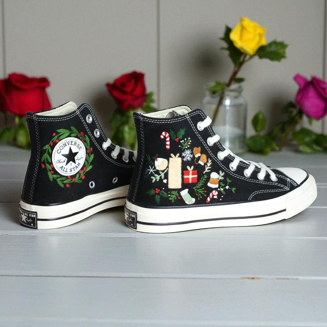 Christmas Converse 2025 embroidered black high top shoes with candy cane wreath and gift motifs
