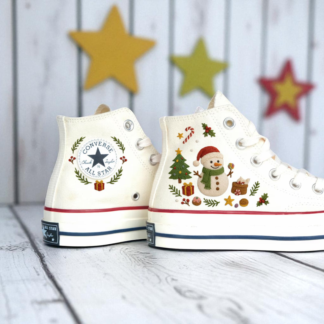 White Converse embroidered high top shoes with snowman tree wreath and gift motifs for christmas converse