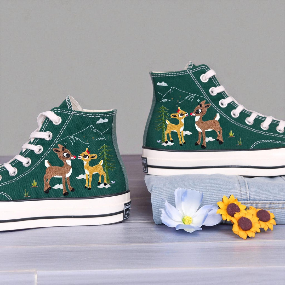 Christmas Converse High Tops embroidered green Converse high tops with reindeer pair mountain and tree motifs white laces