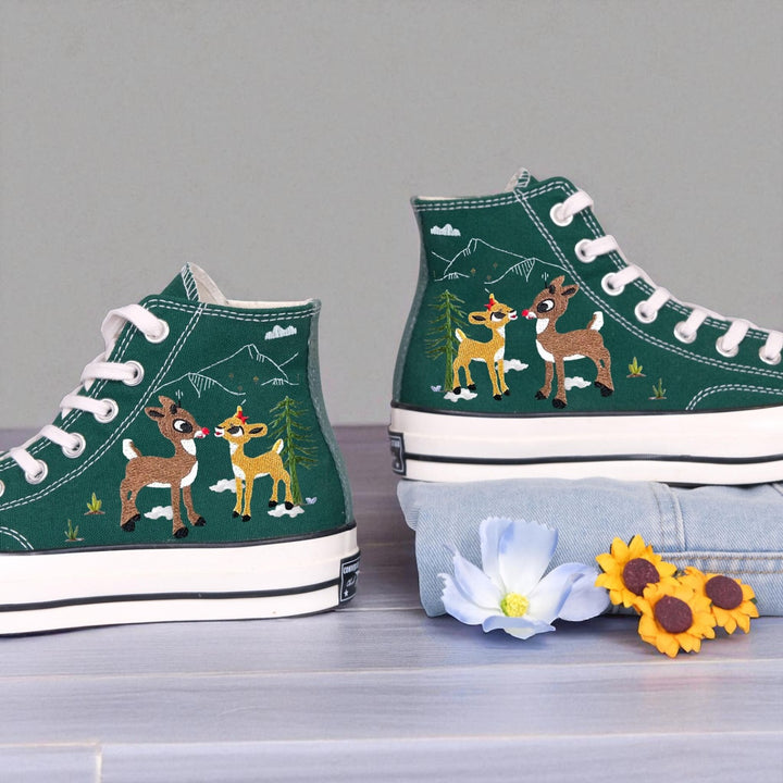 Christmas Converse High Tops embroidered green Converse high tops with reindeer pair mountain and tree motifs white laces