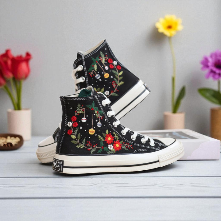 Black Converse high top embroidered shoes with Christmas Converse Ornament Embroidery featuring poinsettias and hanging ornaments