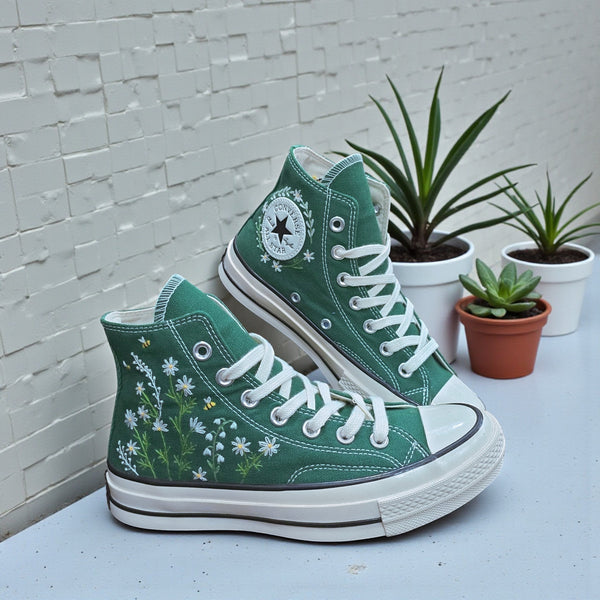 Dark green Converse high top shoes with floral embroidery and classic design