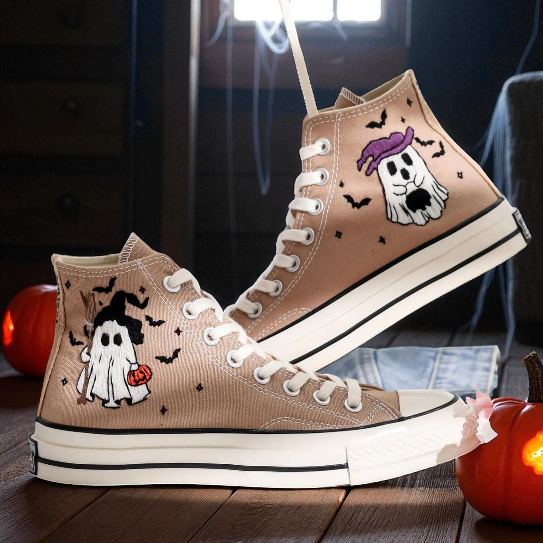 Converse embroidered high top sneakers with tan canvas and ghost embroidery holding pumpkin bats and stars halloween converse shoes