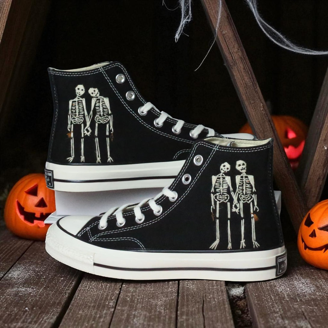 Converse black embroidered high top shoes featuring twin skeleton artwork Halloween Shoes Men Skeleton for spooky outfits