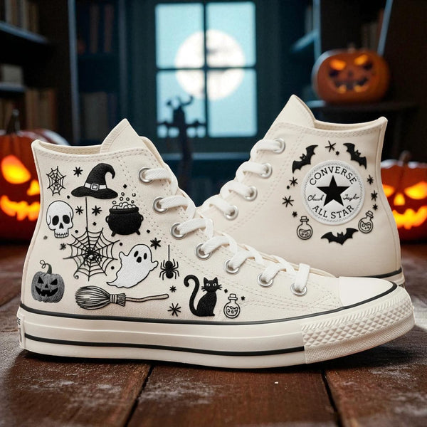 White embroidered high top Halloween Themed Converse shoes with black ghost cat skull bats pumpkin designs