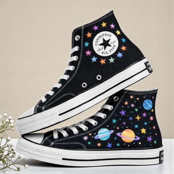 Moon Converse high-top embroidered shoes featuring colorful planets and stars design