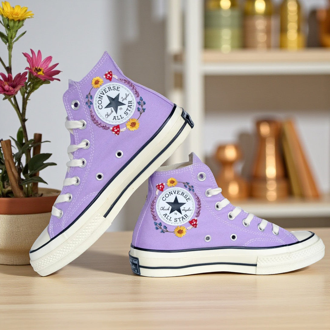 Converse embroidered shoes with mushrooms in lavender color featuring floral designs and classic style