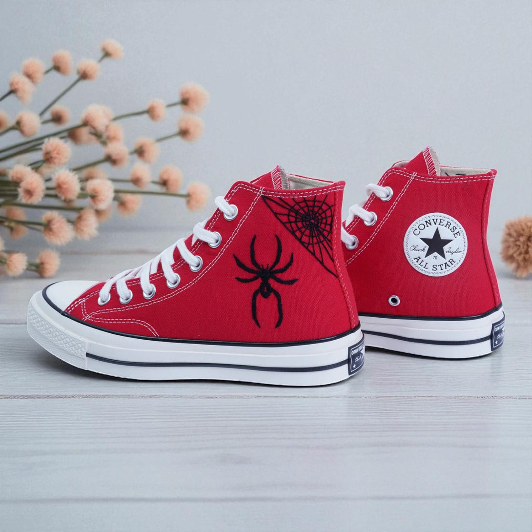 Red Converse embroidered high top Spider Web Shoes featuring black spider and web design on canvas