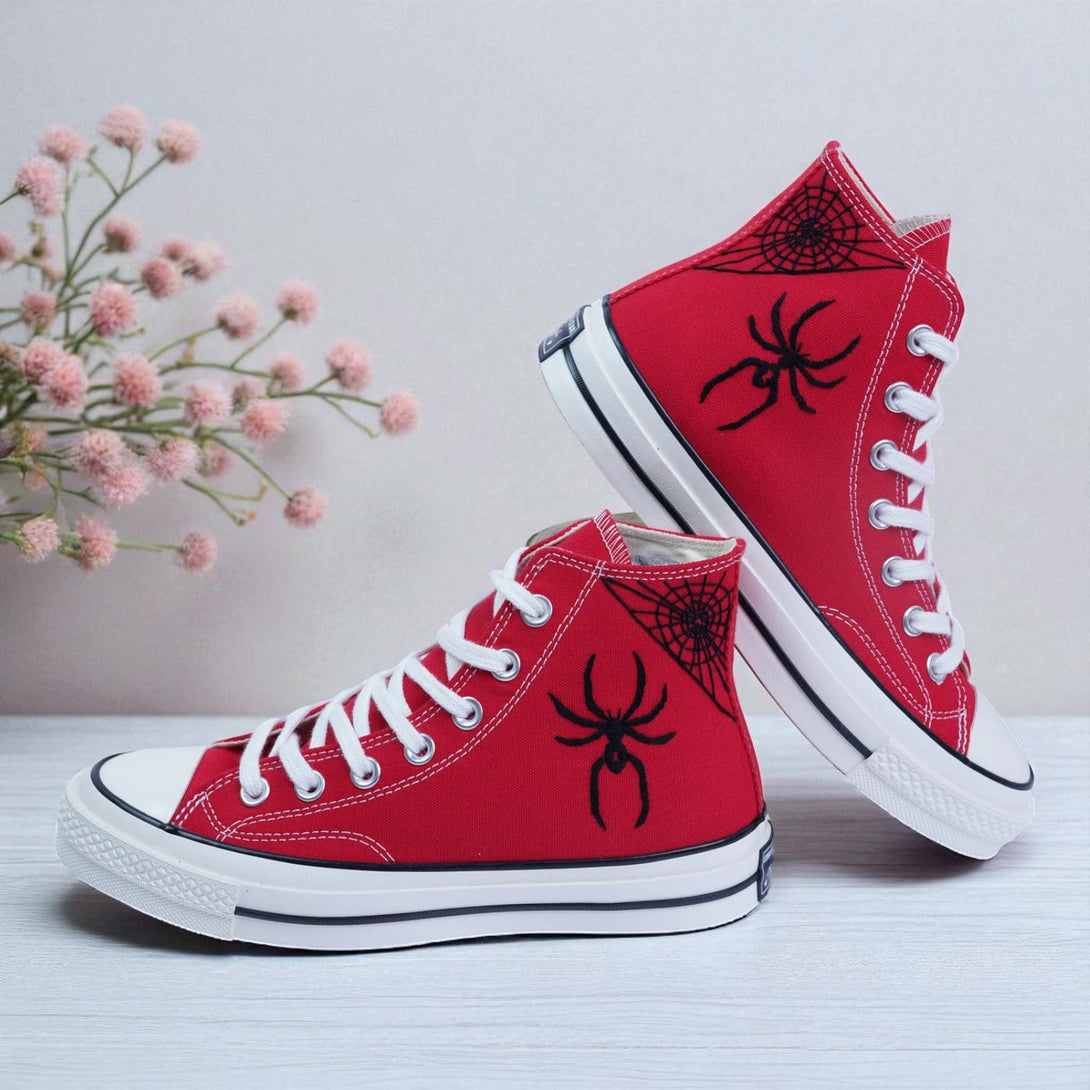 Converse embroidered red high top Spider Web Shoes with black spider and web designs white laces