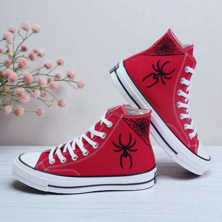 Converse embroidered red high top Spider Web Shoes with black spider and web designs white laces