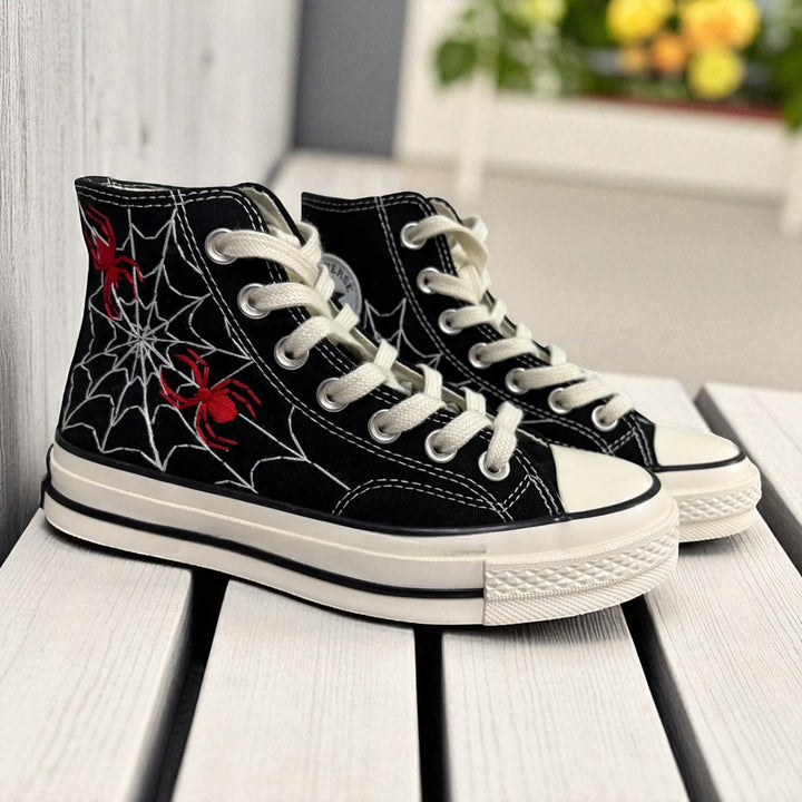 Black high top embroidered Converse shoes with white spiderweb and red spider accents Spiderweb Converse