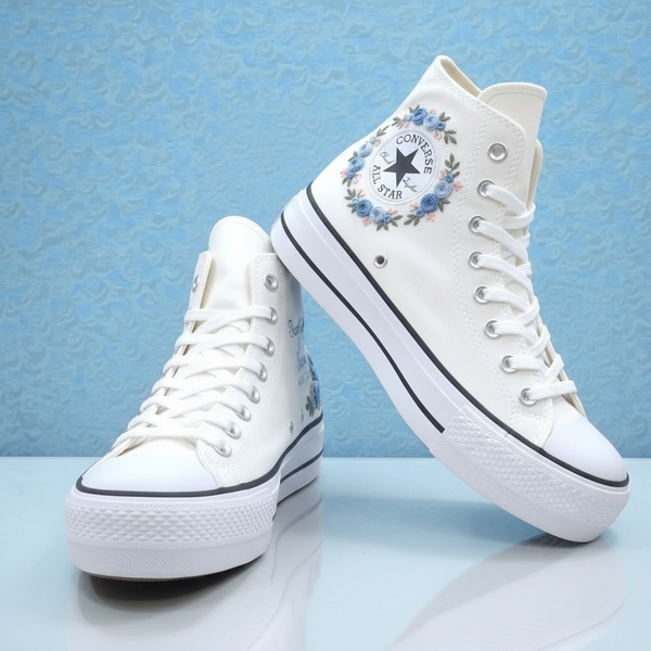 White embroidered Converse wedding sneakers with floral design, perfect for brides on their special day