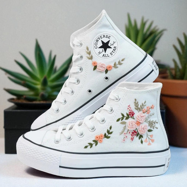 White Converse high top embroidered shoes with pink rose floral embroidery on white canvas for casual wear