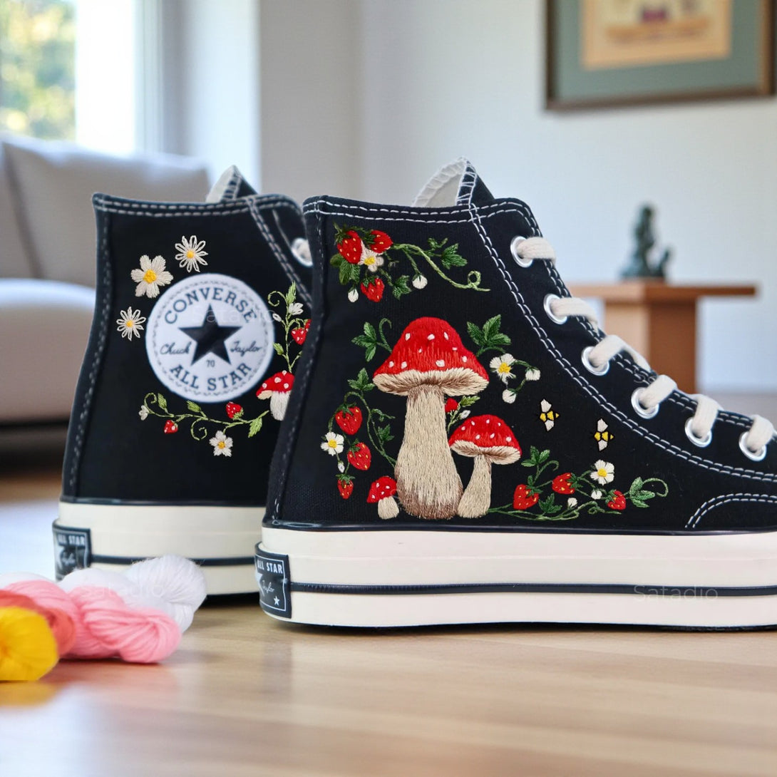 Converse with Mushrooms featuring colorful floral embroidery on classic black high-top shoes