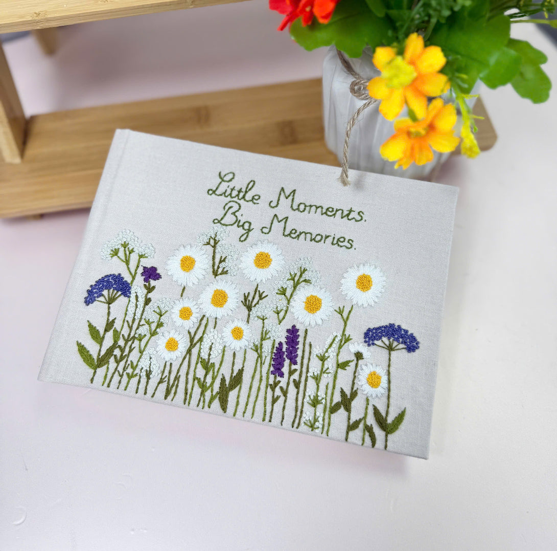 Stitchery Zone notebook with custom fabric cover with floral design and embroidered text Little Moments Big Memories