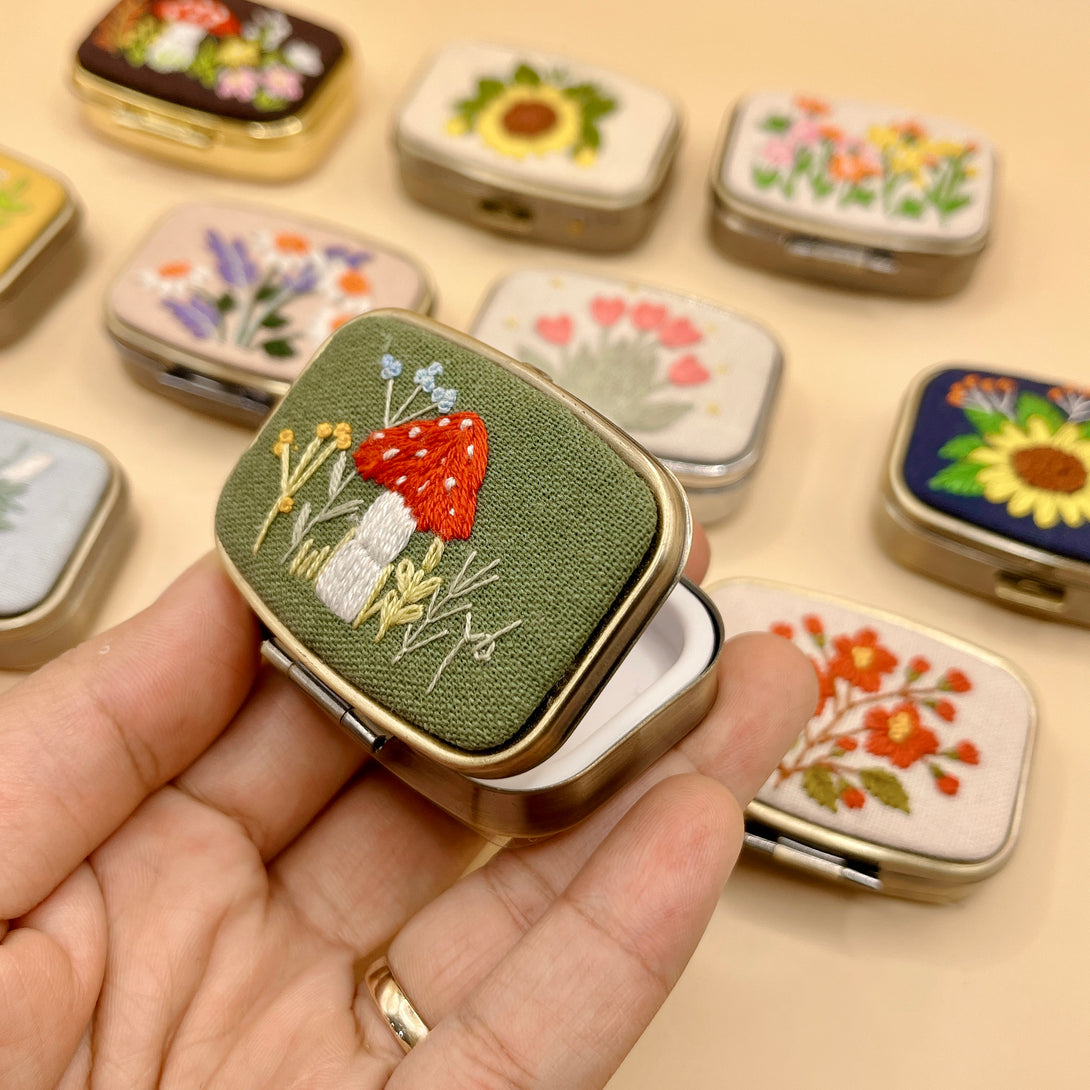 Stitchery Zone custom jewelry box with embroidered mushroom design and small mirror inside