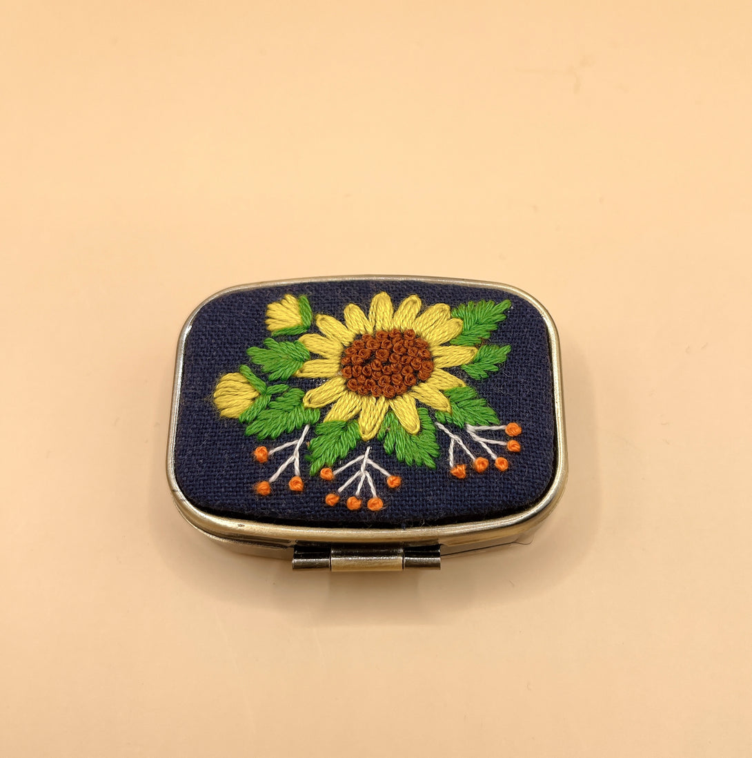 Stitchery Zone custom jewelry box with embroidered sunflower design and metal frame mirror