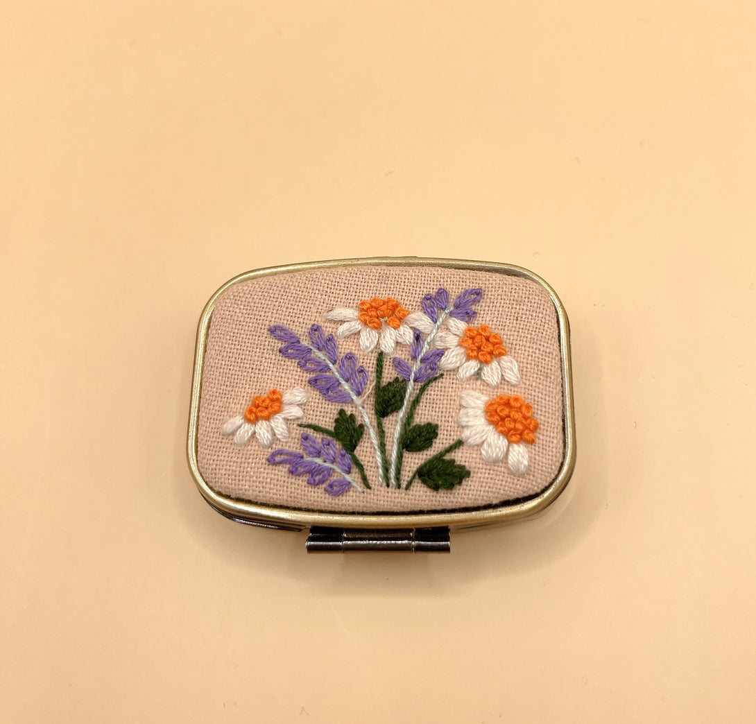 Stitchery Zone mirror with embroidered floral design on fabric lid custom jewelry box