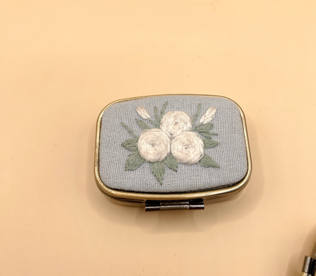Stitchery Zone custom jewelry box mirror with embroidered white roses on gray fabric cover