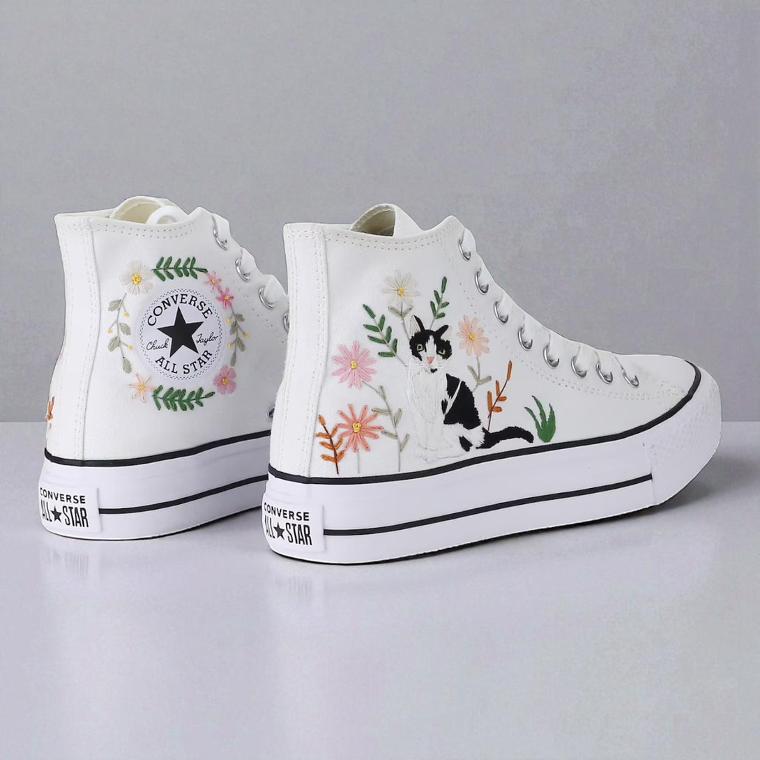 Cute Embroidered Converse high-top shoes with floral and cat designs for a stylish look