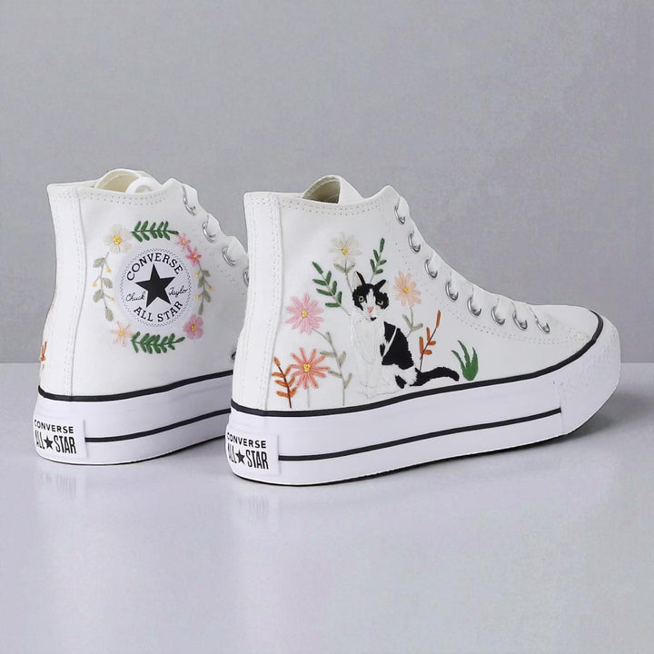 Cute Embroidered Converse high-top shoes with floral and cat designs for a stylish look