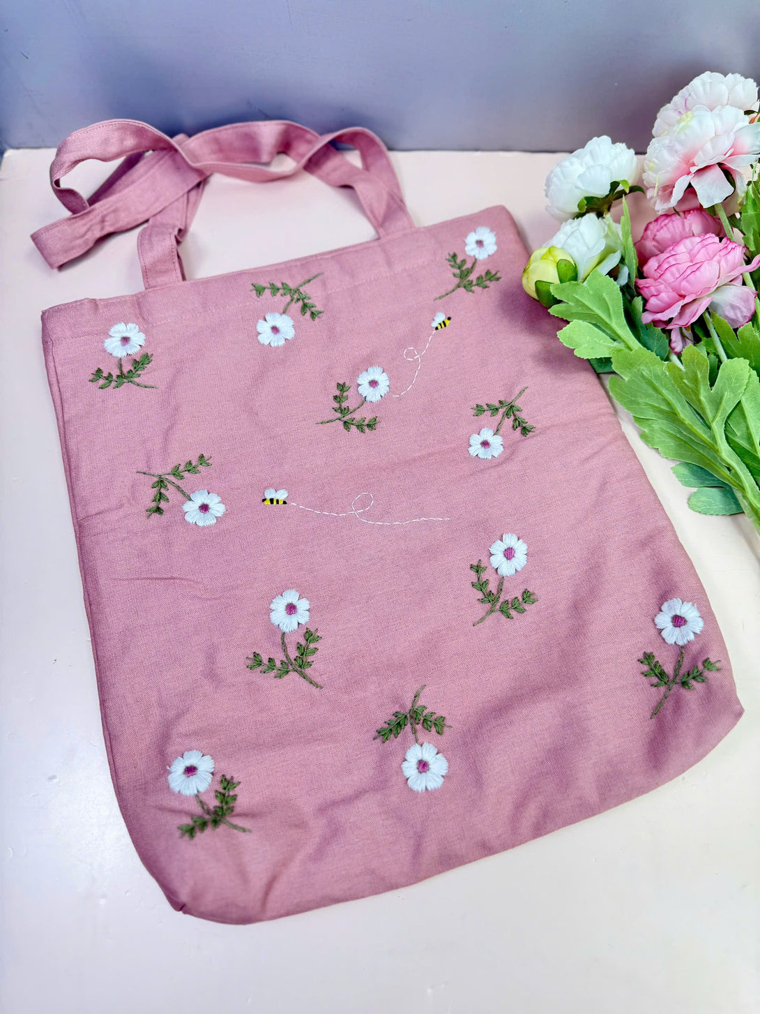 Stitchery Zone Daisy and Bee Embroidered Tote Bag in pink with white flowers and bee designs
