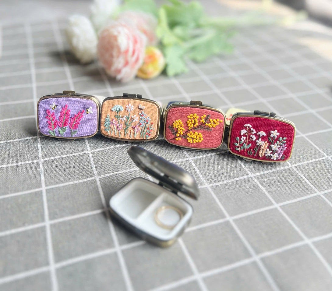 Embroidered Jewelry Box collection by Stitchery Zone with colorful floral designs and compact mirror inside