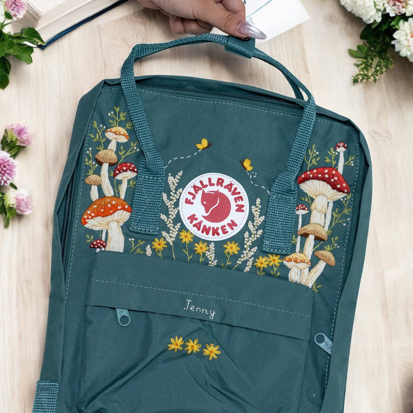 Fjallraven Kanken Backpack in teal with mushroom embroidery, perfect backpacks for school.
