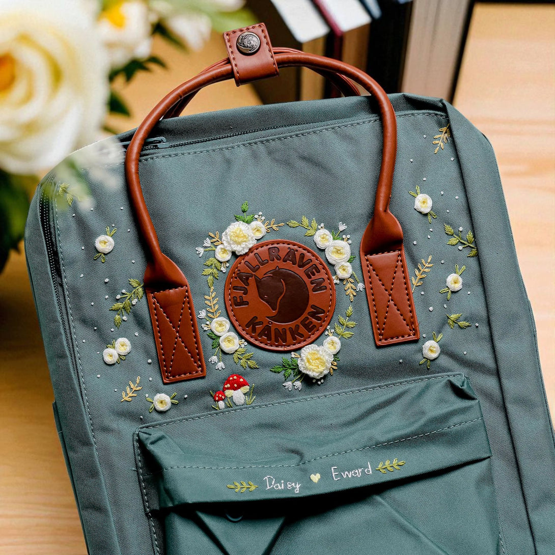 Stitchery Zone Fjallraven Mini Kanken Backpack green with leather handles floral embroidery and front pocket