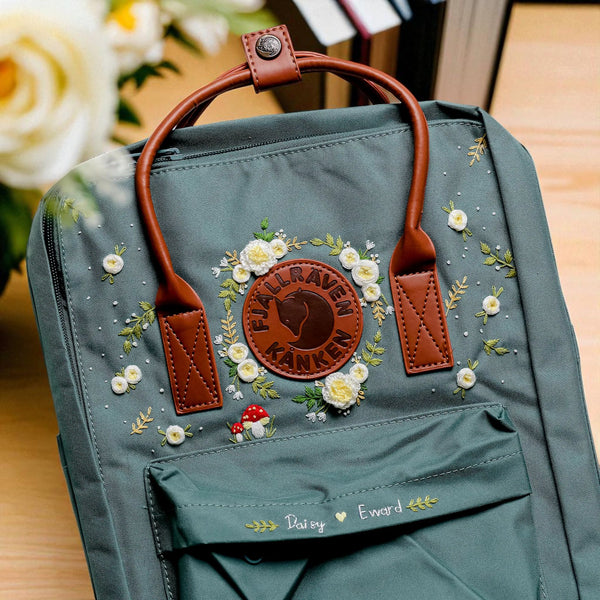 Stitchery Zone Fjallraven Mini Kanken Backpack green with leather handles floral embroidery and front pocket