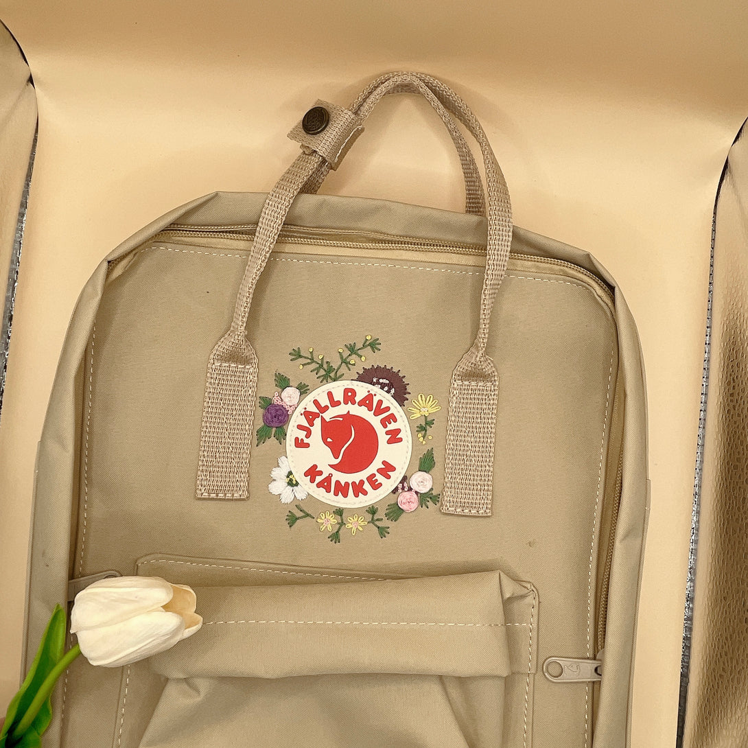 Stitchery Zone beige floral embroidery school bag with top handles and front pocket