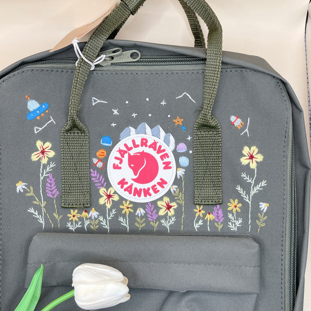 Stitchery Zone floral kanken backpack for women in gray with colorful floral and space-themed embroidery