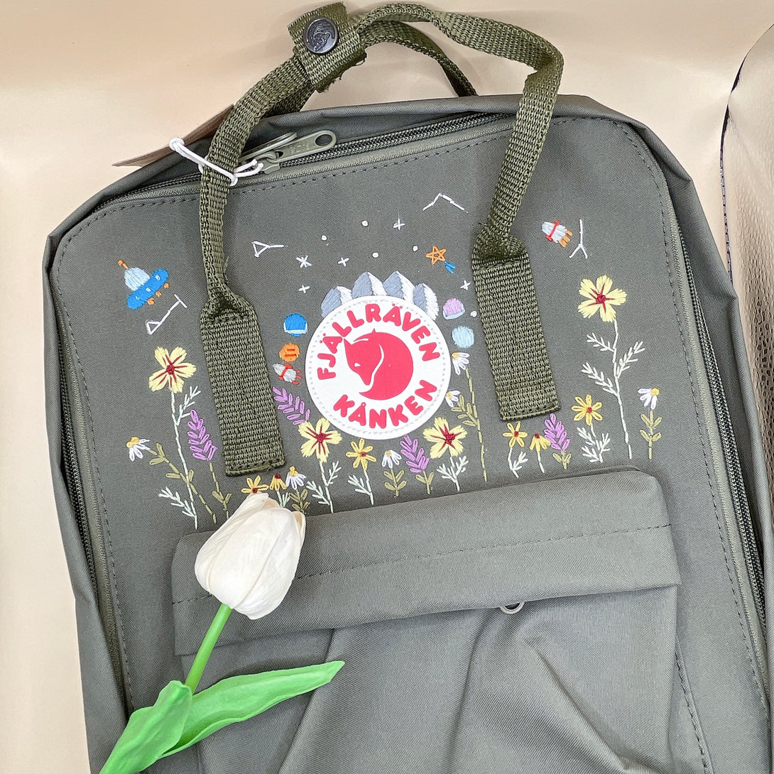 Stitchery Zone floral kanken backpack for women in olive green with colorful flower and space-themed embroidery