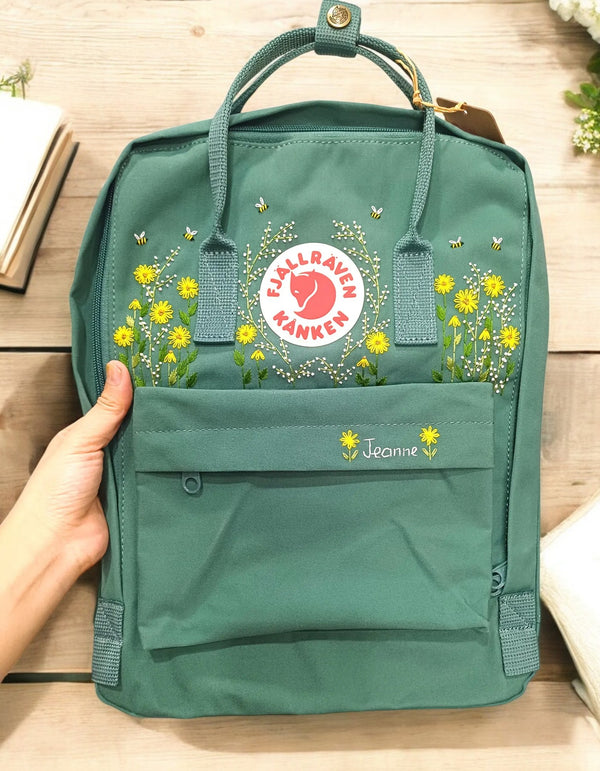 Kanken laptop 15 backpack in teal with floral embroidery and front pocket for stylish storage