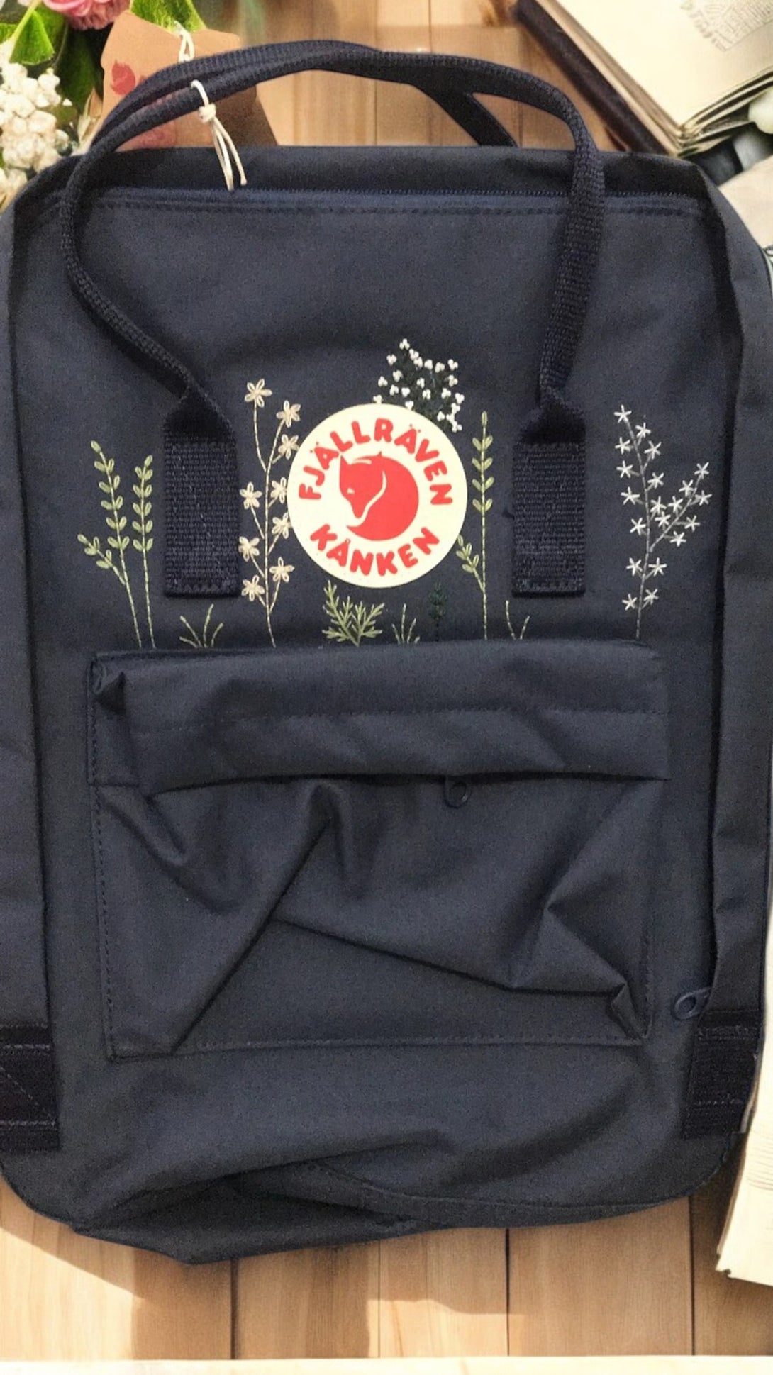 Fjallraven Kanken Laptop 17 Backpack in Navy with Floral Accents and Front Pocket