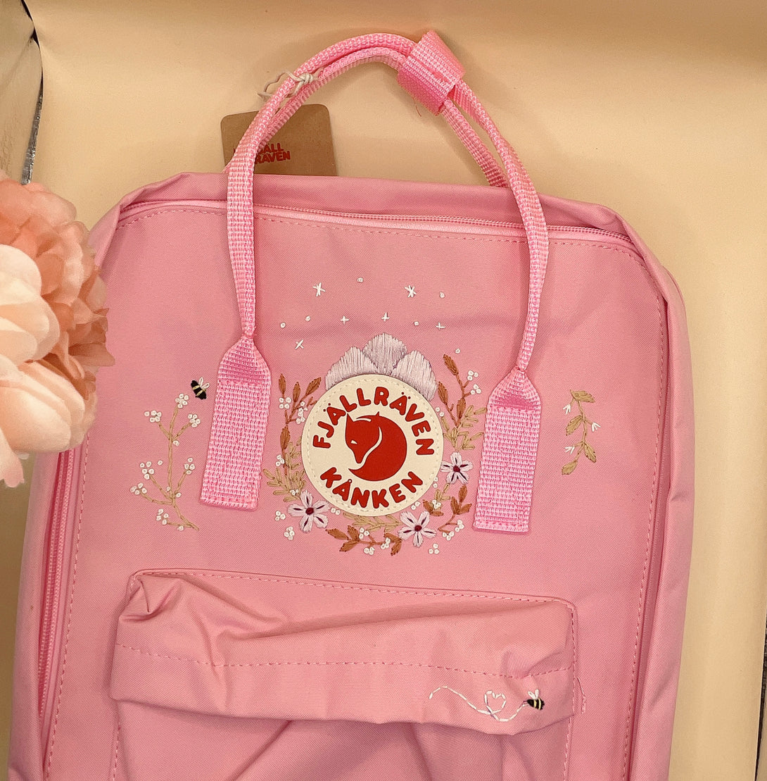 Stitchery Zone pink personalized children's backpack with floral embroidery and sturdy top handles