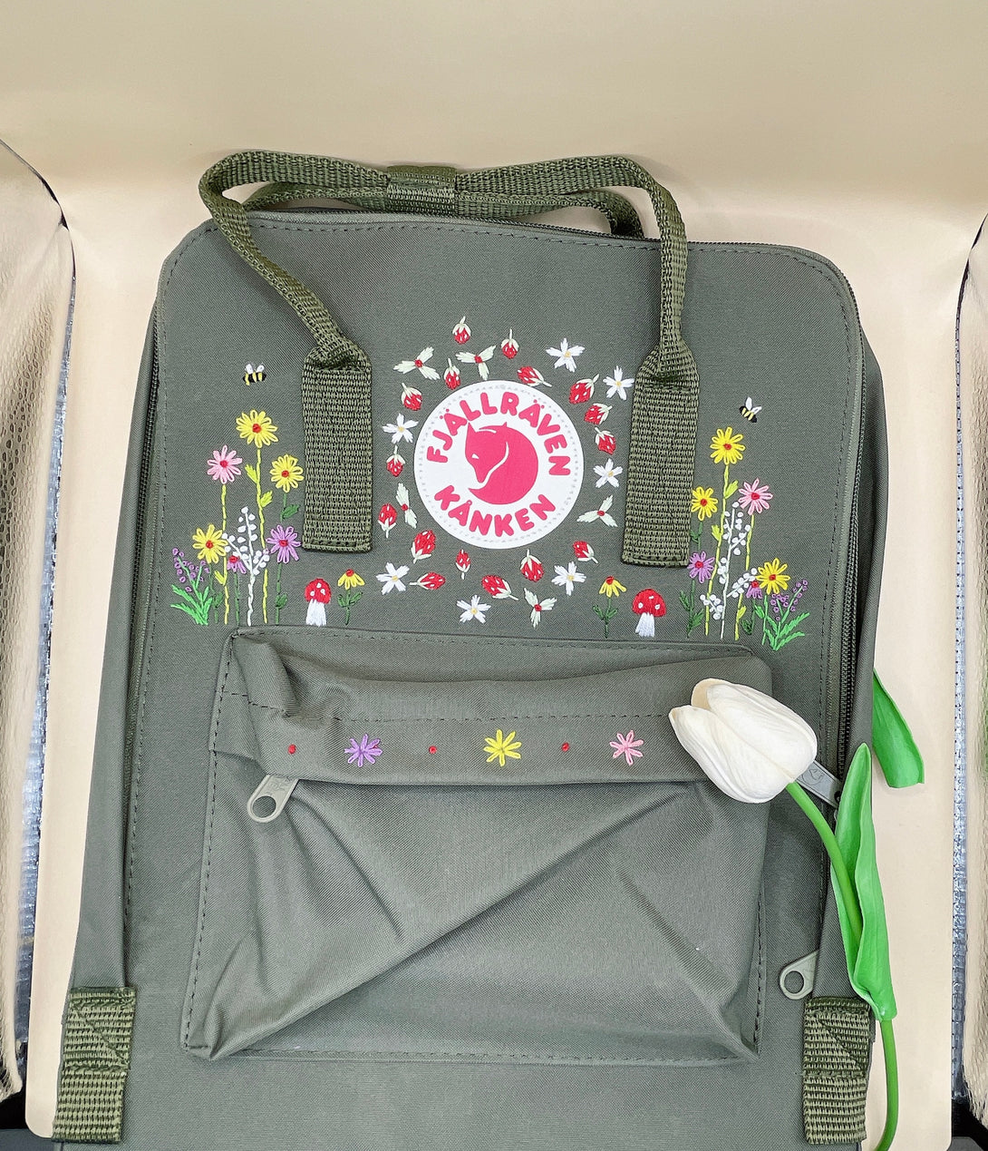 Unique floral backpack for school by Stitchery Zone in olive green with colorful flower and bee embroidery