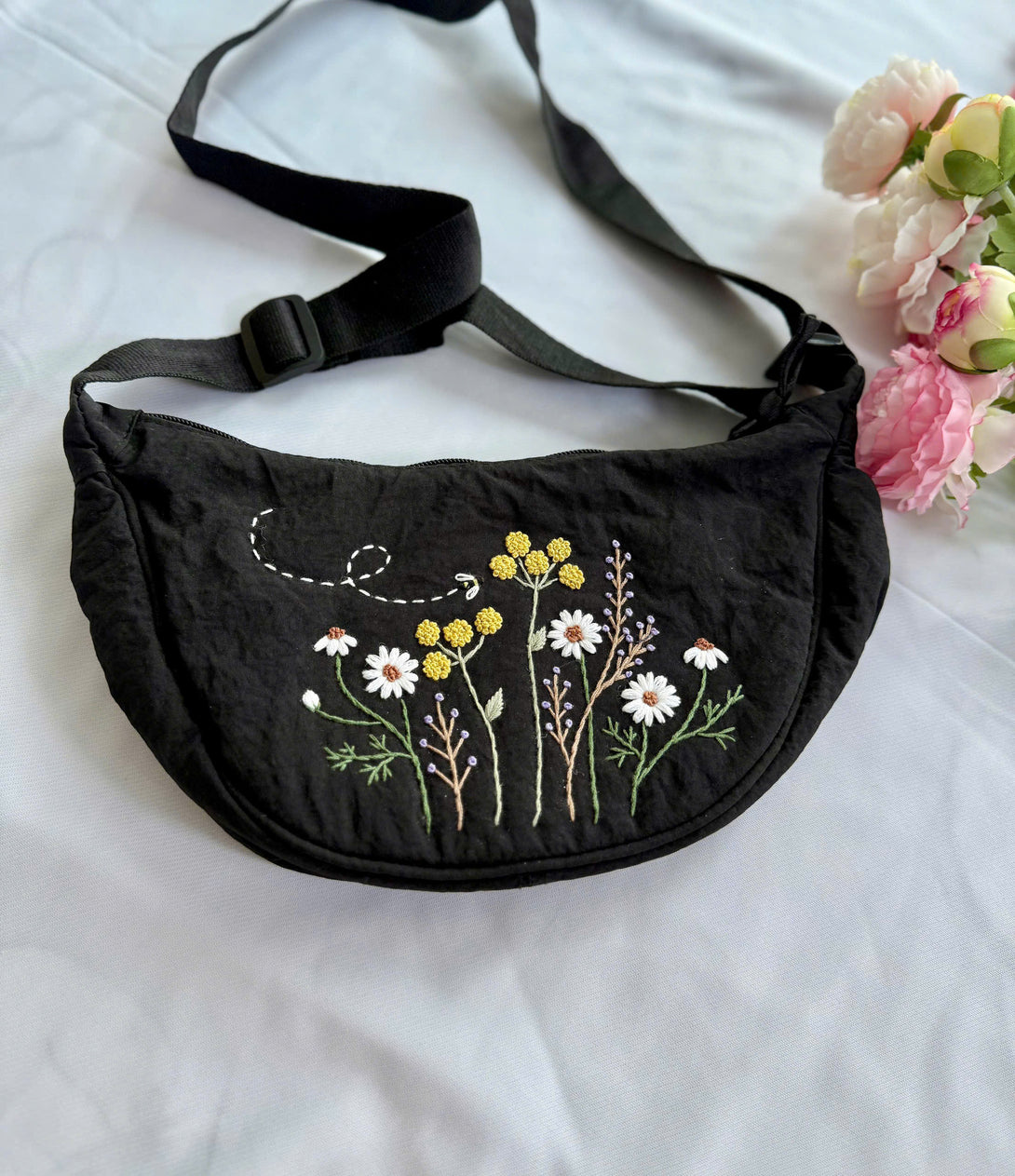 Stitchery Zone Flower Garden Hand Embroidered Cross Bag in black with floral embroidery and adjustable strap