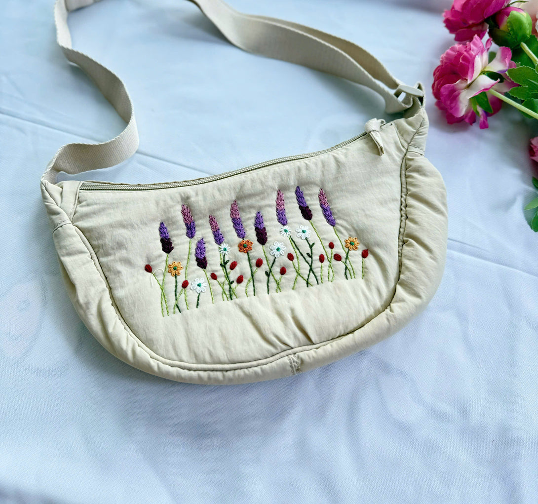 Flower Garden Hand Embroidered Cross Bag in beige with colorful floral embroidery and adjustable strap