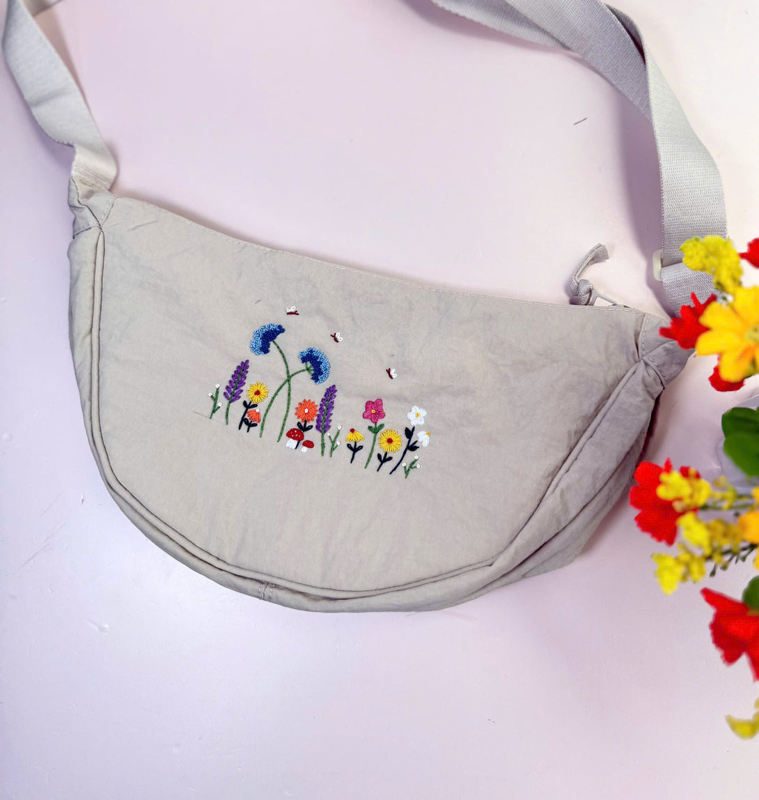 Stitchery Zone Flower Garden Hand Embroidered Cross Bag with colorful floral design and adjustable strap