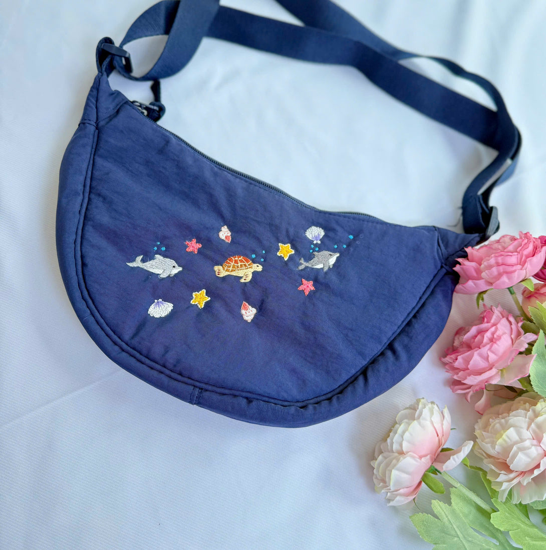 Flower Garden Hand Embroidered Cross Bag by Stitchery Zone in navy blue with marine life designs