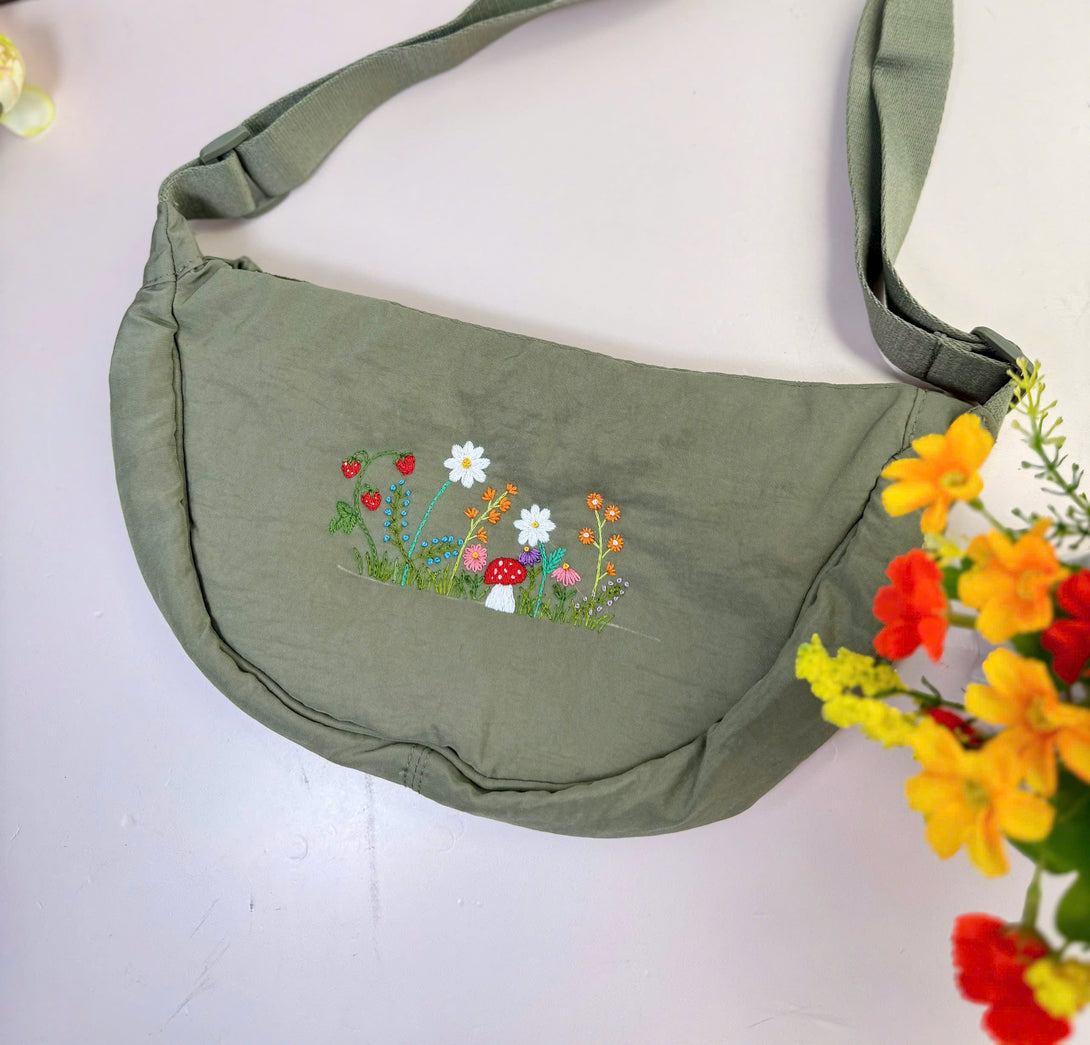 Stitchery Zone Flower Garden Hand Embroidered Cross Bag in olive green with colorful floral embroidery