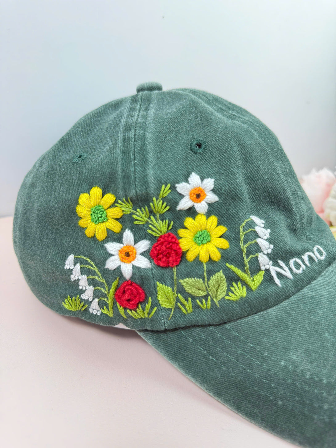 Flower Garden Personalised Embroidered Hat in green with colorful floral embroidery and custom name stitching